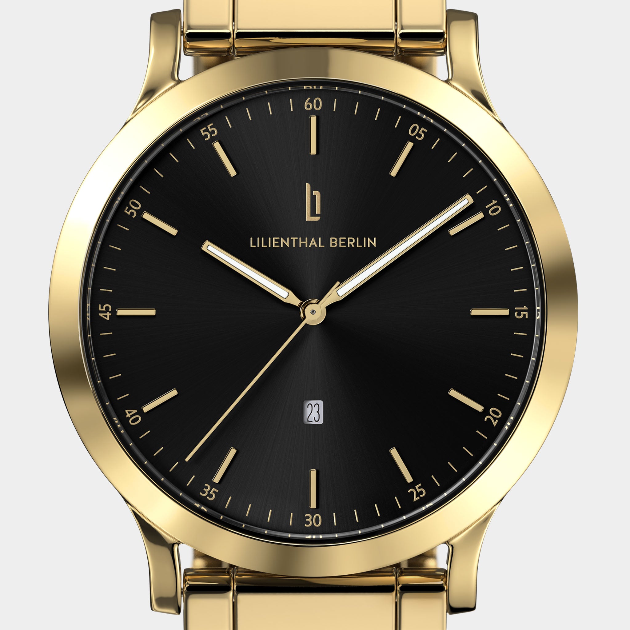 Gold watch with black dial, minimalist face, date display and gold metal bracelet