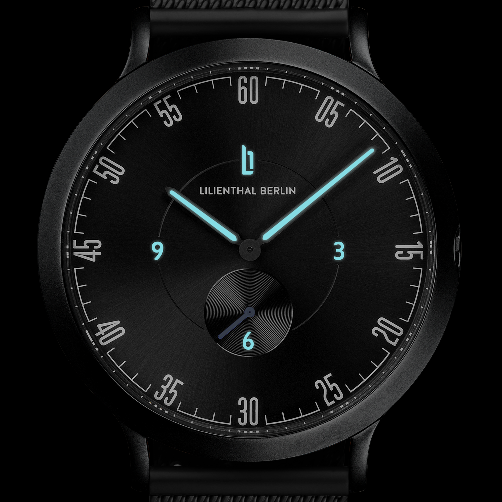 Black minimalist analog wristwatch with luminous blue hands and Lilienthal Berlin logo