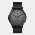 Minimalist black mesh strap watch with grey dial and date display