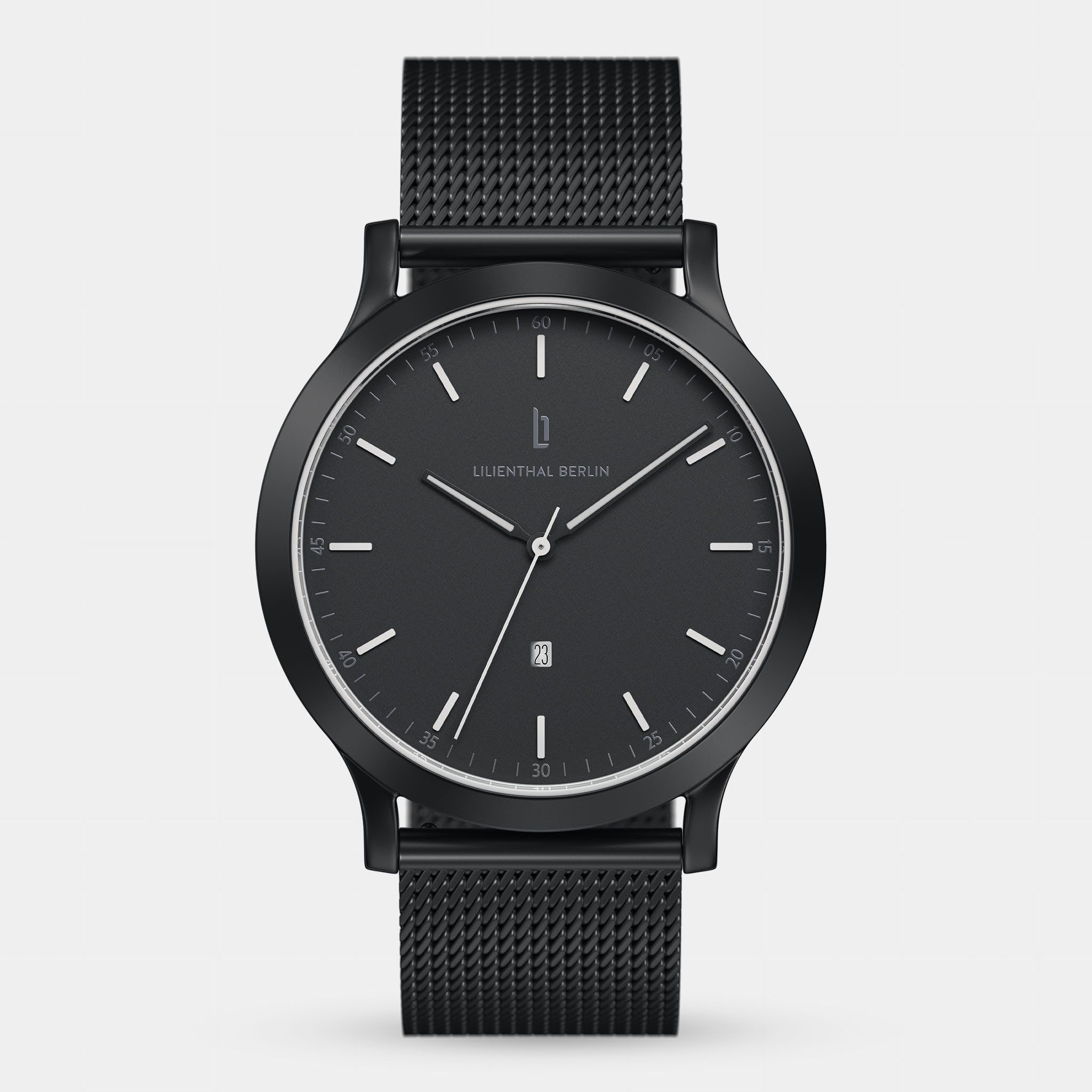Minimalist black wristwatch with mesh strap and date display on white background