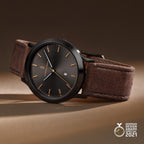 Elegant men's watch with brown leather strap and black dial, German Design Award 2021 winner