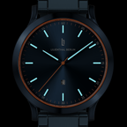 Modern dark blue analog wristwatch with luminous markers, orange accents, and date display